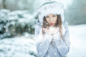 Young woman winter portrait. Shallow dof.